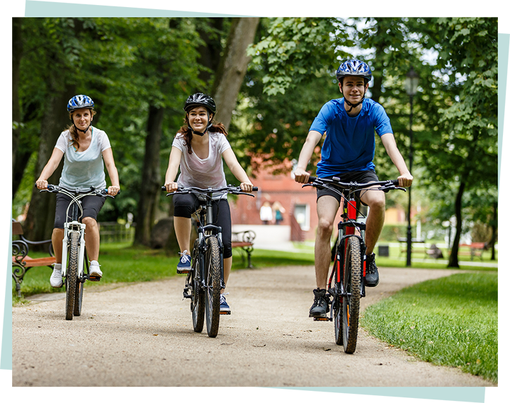 Image showing a group of people riding their bikes.